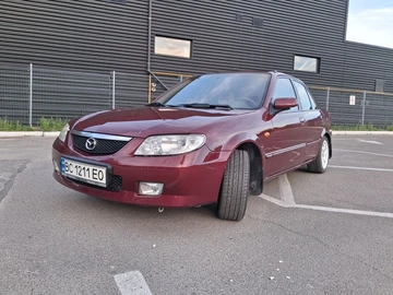 Авто Mazda 323 2003 № 8873249