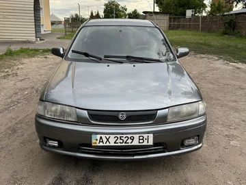 Авто Mazda 323 1999 № 8880378