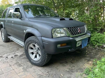 Авто Mitsubishi L 200 2004 № 8883899
