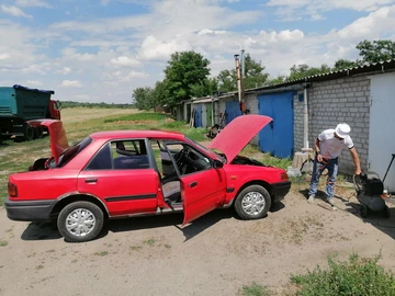 Авто Mazda 323 1996 № 8884432