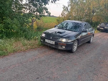 Авто Mazda 121 1997 № 8884924