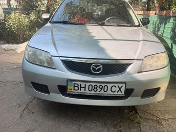 Авто Mazda 323 2002 № 8885951