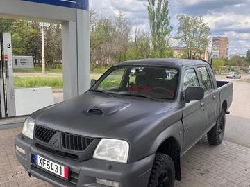 Авто Mitsubishi L 200 2004 № 8889671