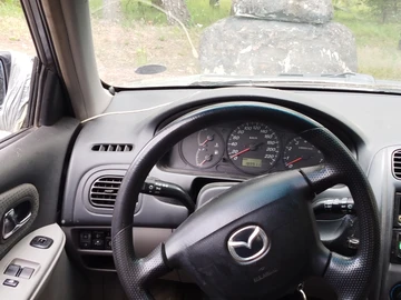 Авто Mazda 323 2001 № 8890584