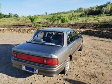 Авто Mazda 323 1993 № 8894508