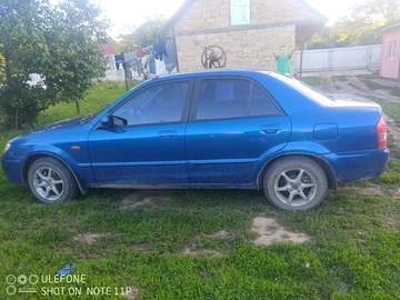 Авто Mazda 323 2001 № 8903315