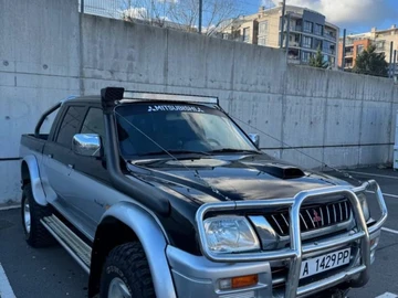 Авто Mitsubishi L 200 2004 № 8904088