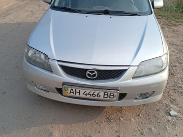 Авто Mazda 323 2003 № 8911971
