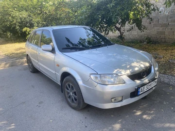 Авто Mazda 323 2002 № 8915647