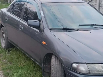 Авто Mazda 323 1996 № 8924351