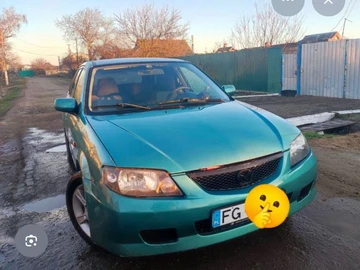 Авто Mazda 323 2002 № 8935140