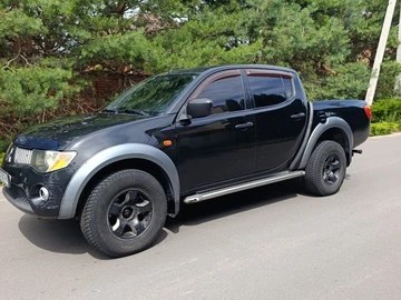 Авто Mitsubishi L 200 2009 № 8937170