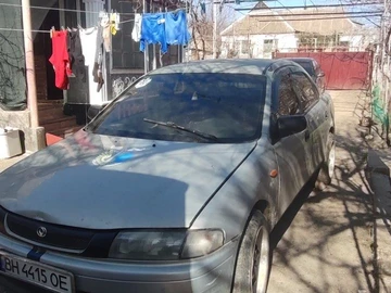 Авто Mazda 323 1997 № 8945175