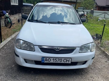Авто Mazda 323 1999 № 8949708