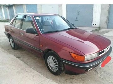 Авто Mitsubishi Colt Lancer 1991 № 8950720