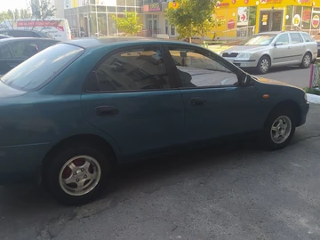 Авто Mazda 323 1995 № 8950885