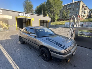 Авто Mazda 323 1989 № 8952399