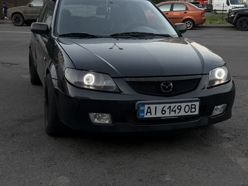 Авто Mazda 323 2001 № 8955236