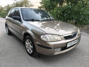 Авто Mazda 323 2000 № 8959060