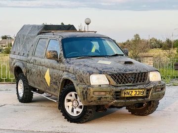 Авто Mitsubishi L 200 2004 № 8968264
