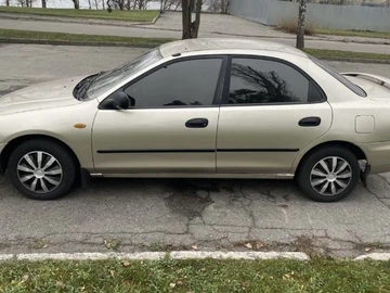 Авто Mazda 323 1996 № 8970214
