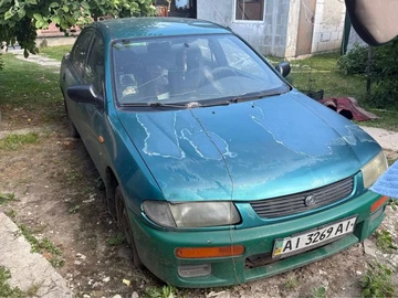 Авто Mazda 323 1996 № 8973085