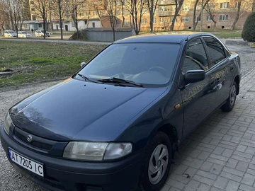 Авто Mazda 323 1998 № 8975913