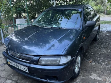 Авто Mazda 323 1997 № 8979267