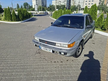 Авто Mitsubishi Lancer 1990 № 8980037
